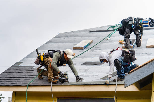 Professional Gutter Installation technician working in Burton, TX